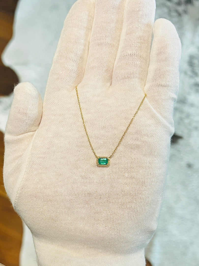 Emerald With Diamond Frame